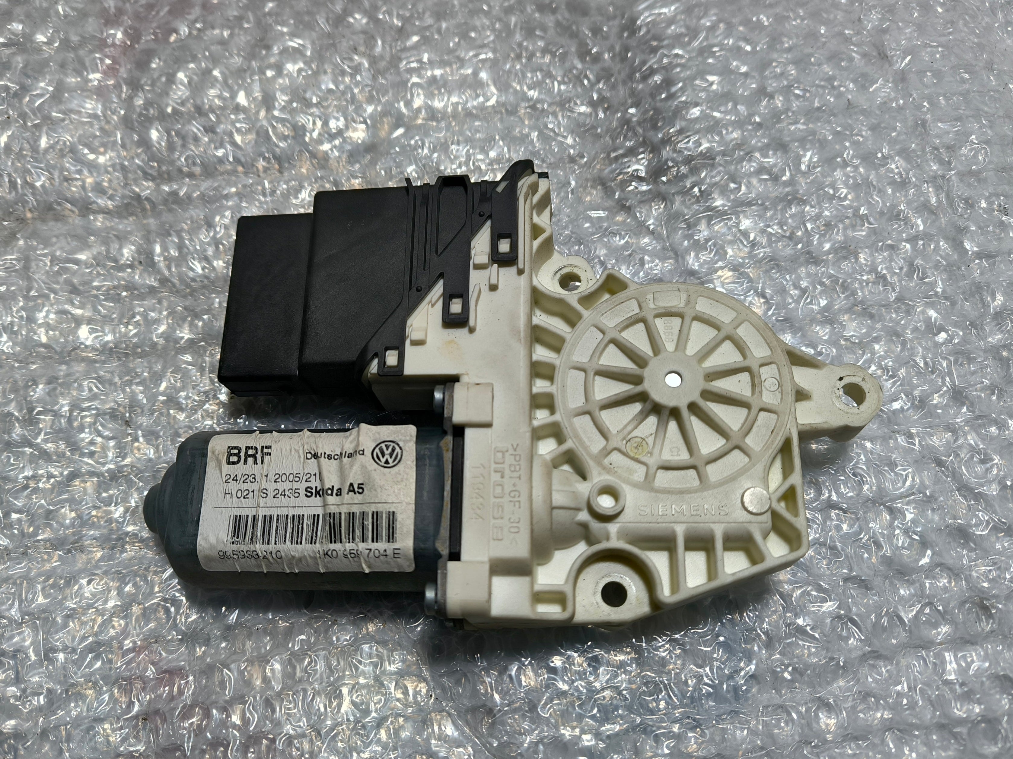 Motor stahovačky 1K0959704E Octavia II
