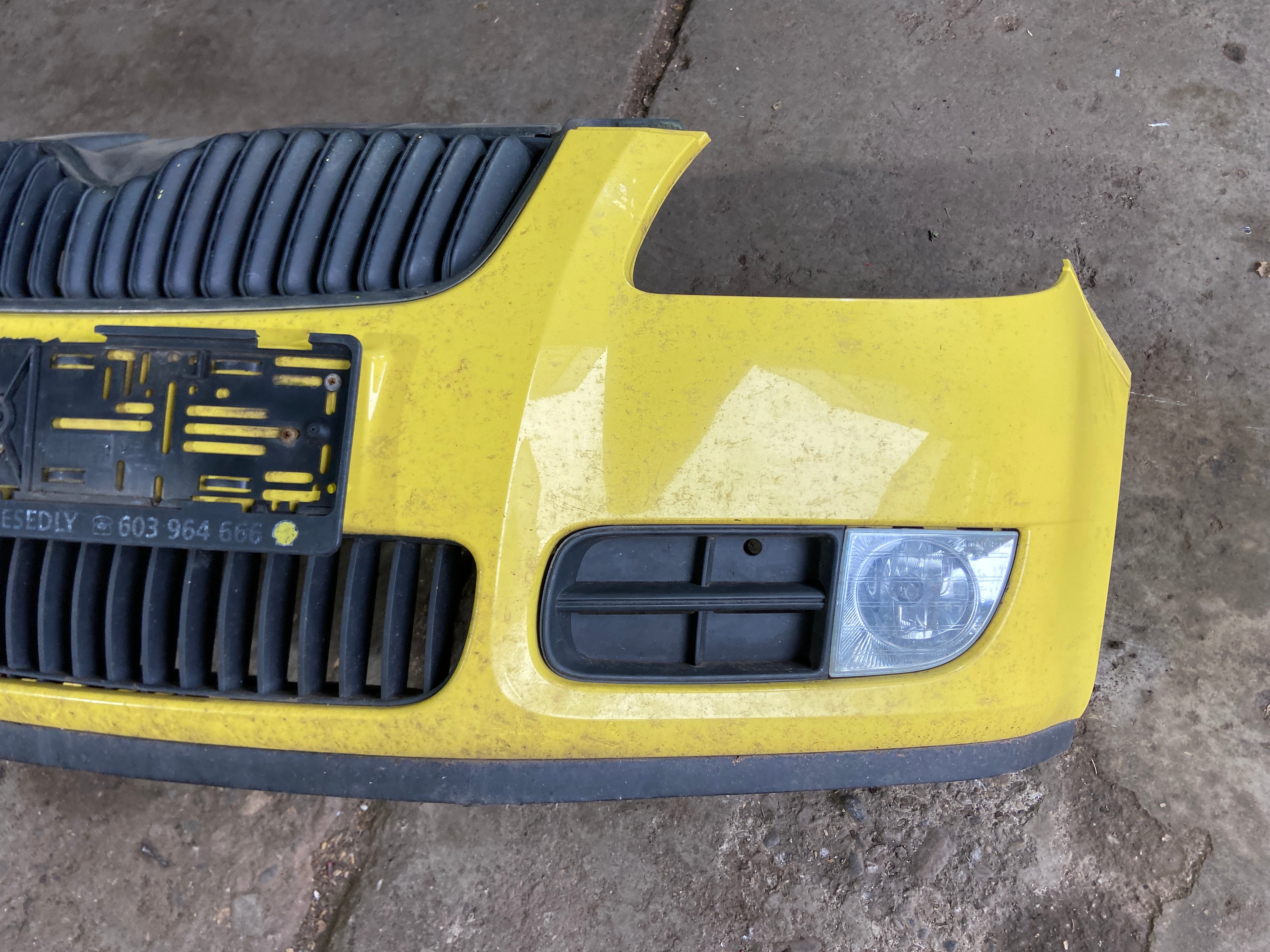 Přední nárazník s maskou Škoda Fabia 2 / Roomster